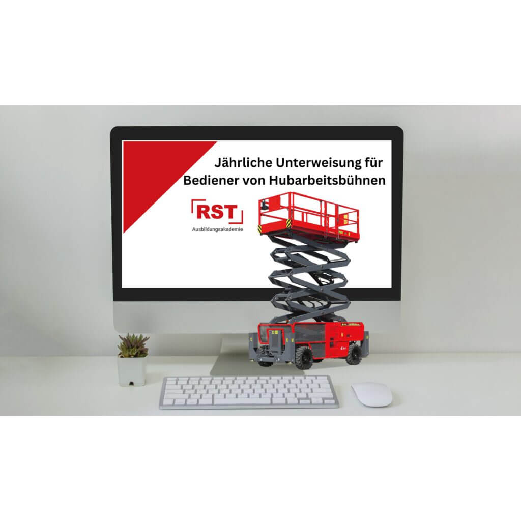 Monitor shows a red-and-white training poster on an aerial work platform operator course; includes a red lift graphic on white background/screen edge visible.