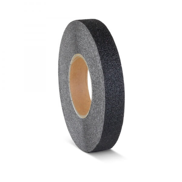Roll of black textured tape with a brown cardboard core, standing upright on white background.